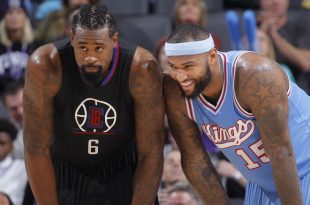 DeAndre Jordan DeMarcus Cousins look on iso