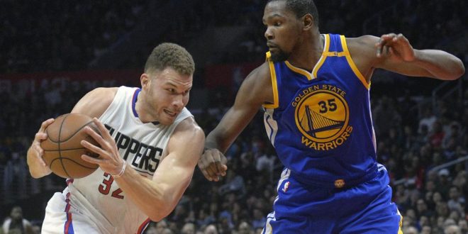 Blake Griffin drives on Kevin Durant